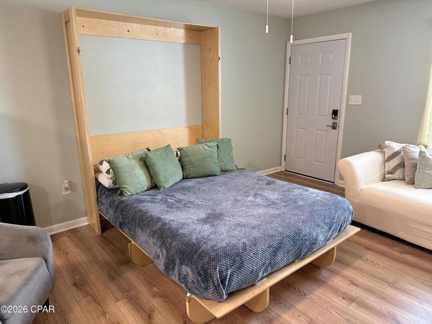 OVER $20,000 on AirBnB each year for the past two years.  OWNER FINANCING AVAILABLE (Interest rate negotiable, 5 year balloon).  NEW HVAC - SEPTEMBER 2025.   NEW WASHER/DRYER -- NOVEMBER 2025.  COMPLETELY RENOVATED IN 2023, including New flooring, All new windows, new doors, New furniture (FULLY FURNISHED).  New Granite kitchen countertops, new appliances, under-mounted sink.  BATHROOM WAS COMPLETELY GUTTED AND REMODELED in 2023.  
Studio condo with Murphy bed.  Just off North Lagoon Dr.  HOA dues under $200/mo.  EASY TO SHOW!!!