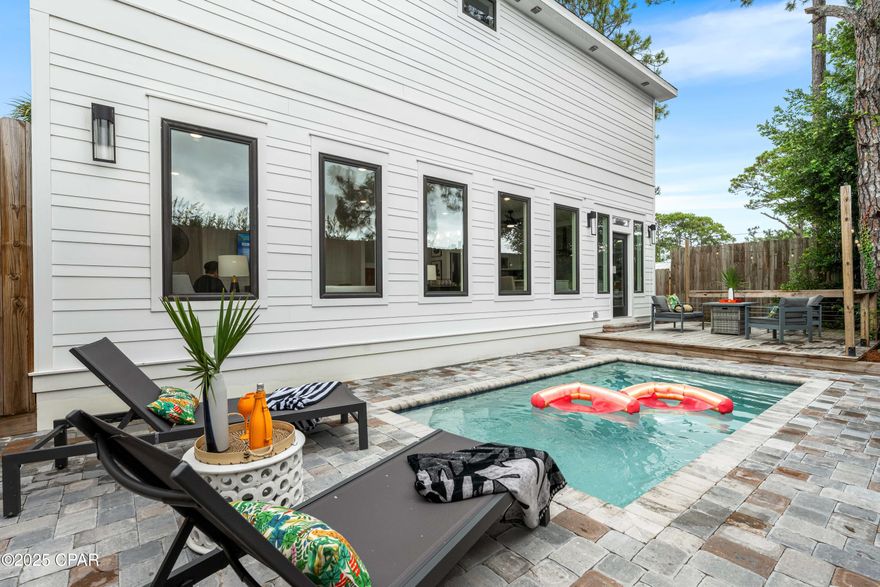 Welcome to 318 El Prado Place - a fully furnished, turnkey 4BR/3BA home in Panama City Beach, FL, recently named TripAdvisor's #1 Summer Vacation Destination for 2025. This spacious retreat features open-concept living with light-filled rooms, luxury finishes, and a private backyard with pool and patio—perfect for relaxing or entertaining. Ideally located in a quiet residential enclave just minutes from the Gulf, Pier Park, and top local attractions. Whether you're seeking a family home or a short-term rental, this property offers comfort, style, and unbeatable convenience.