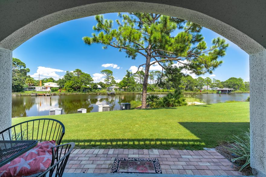 ***CURRENTLY UNDER CONTRACT, SELLER ACCEPTING BACK UP OFFERS*** Gorgeous views of Grand Lagoon and the pool from this 1bd, 1.5 ba first floor unit in the gated community of Villas of St. Thomas*** (Pending assessment has been paid in full by the seller) You are less than a 2 block walk from the beach! Just step out on to your patio and enjoy the relaxing views and easy access to all of the complex amenities. This fully furnished unit is completely tiled and comes with stainless steel appliances. Complex amenities include tennis courts, a lagoon front pool, and a community boat dock. All information is approximate and should be verified by buyers if important