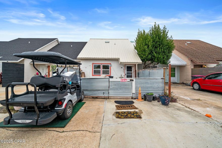 NO HOA!! This one bedroom, 1 1/2 bath townhome just off of Thomas Dr. is a must see.   Only 1/2 mile to Rick Seltzer park for easy beach access.  There is also bunk beds in the hall downstairs for extra guests.  This townhome has had a lot of updates to it.  AC, metal roof, hot water heater, new pavers front and back.  Stainless appliances in the kitchen.  Complete remodel of the primary shower upstairs.  Great location for short or long term rentals as an investment property.  

Buyer to verify all measurements if important.