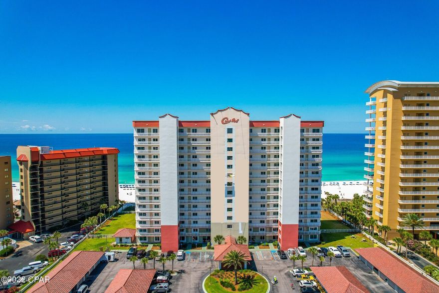Reward yourself with this immaculate, 2 bedroom, 2 full bathroom condo. Located in one of the most desirable locations of Panama City Beach. You'll love the convenience of shopping, world class dining, beautiful St Andrews State Park, entertainment, marinas and the white sandy beaches just outside your door. This unit boasts over 1,400sq.ft of heated and cooled living space. The moment you enter the home you will notice the breathtaking views of the Gulf as well as the detail in the units finishes. The spacious kitchen has custom cabinets with pull out drawers, granite countertops, stainless steel appliances, tray ceilings with can lighting, tiled back splash, plenty of pantry space and a breakfast bar. The large sliding doors allow natural light to flow throughout the unit's open floor plan. Entertaining family and friends is easy with the ample space provided throughout this unit. Highlights include 2 parking spaces, updated flooring throughout the unit, water heater installed within two years, crown molding, all new hurricane impact windows, new paint on the entire exterior of the unit and a new roof. Walking into the Master suite will make you feel larger than life. The space provided is larger than most condos as well as the large windows making it easy to enjoy the view from your bed. Plantation shutters for all the windows, except sliding doors, are on order. The master bathroom has been completely renovated with a huge tiled shower, granite countertops, separate his and her vanities, tile floors and built-in shelves. The other bedroom provides plenty of space for guests and also has a private full size bathroom. Enjoy your best life at the beach or lay out beside the pool. Coral Reef provides amenities for the entire family to include, a private beach access, covered picnic area, fitness room, beachfront community room with a kitchen and a lot of beach front green space. This unit is absolutely a must see!
