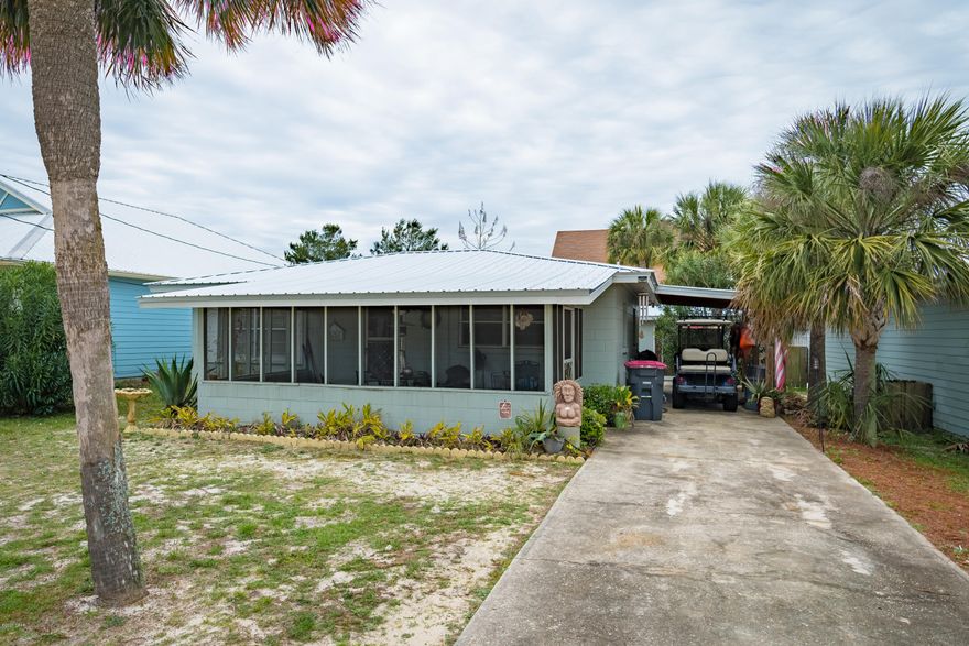 Step back in time with this Block construction home that has Terrazzo floors and a large Screen Porch! The house is a 2 bedroom, A Brand New Metal Roof has just been installed! This classic Florida Cottage home, is located on a quite dead end street and is just a short 2 1/2 block walk to a public beach access.

There is an outdoor shower and a carport to keep your golf cart! Also a storage room and in the backyard, a small storage building.

If details and dimensions are important, please verify