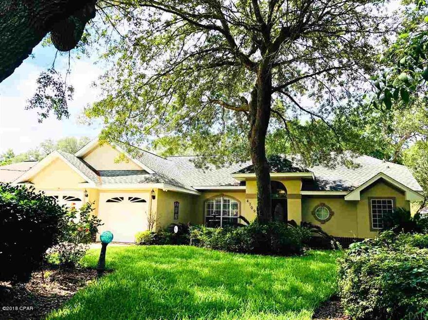 Updated in MLS for COMPS use ONLY.  Custom Built Luxury Home on a Gorgeous High and Dry .58 Acre Property on Coveted Hickory Shores Blvd. Open Floor Plan with Split Bedrooms. 3 Bedrooms, 2 Baths, Great Room, Open Dining Room, and Breakfast Nook. Soaring 14' Cathedral Ceilings in the Great Room, Master Suite and Kitchen. Dual Sided Gas Fireplace Between the Great Room and Master Suite. The Master Bedroom has an Impressive Gas Fireplace Flanked by Solid Wood Built-ins and an Arched Art Niche. Dual Sliding Door to the Screened Porch. Master Bathroom is Luxurious, with a 6-Jet Whirlpool Rub with a Glass Block Accent Window, Double Vanity, Fully Tiled Double Size Shower with Dual Heads and a Corner Bench, Water Closet, Linen Closet and Large Walk-in Closet with a Captain's Glass Block Window. COMPS USE ONLY this is a COPY OF LISTING INFO FROM PARMLS 537862
The Great Room has a Triple Sliding Door to the Screened Porch, Which has Dual Screened Doors to the Covered Patio. A Detached Workshop with French Doors has Electricity, a Metal Roof and is ideal for an Artist's Studio, Woodwork or Crafts, or Could Easily Be Converted to Guest Quarters. Majestic Southern Oaks, Crepe Myrtles and Established Beds of Azalea, Camellia, Sago Palm and Flowering Shrubs Envelope the Property, Making a Secluded Eden for Privacy Lovers. More than Enough Space for a Garden; Room for Kids and Pets to Romp on Their Own Property, and Still Room for a Pool. Three Side Brick, Front Side Stucco with Oversized Double Split Double Garage. Enjoy Mornings and Evenings on the Screened Porch or Paver Patio with an Insulated Awning. Custom Features Include: Accent Lighting, Plant Ledges, Arched Transom Window in the Open Dining Area with Plantation Shutters, Rounded Corners, Transom Window in the 2nd Bathroom, Composite Shingle Roof, Triple Coach Lanterns, Eave Lighting and Security Flood Lights Front and Back, Extra Parking PLUS a Well and Sprinkler System to Keep the Grounds in Shape Year Around. Life on Hickory Shores Blvd. is Like no Other in the Area! Call Today for Your Personal Tour.