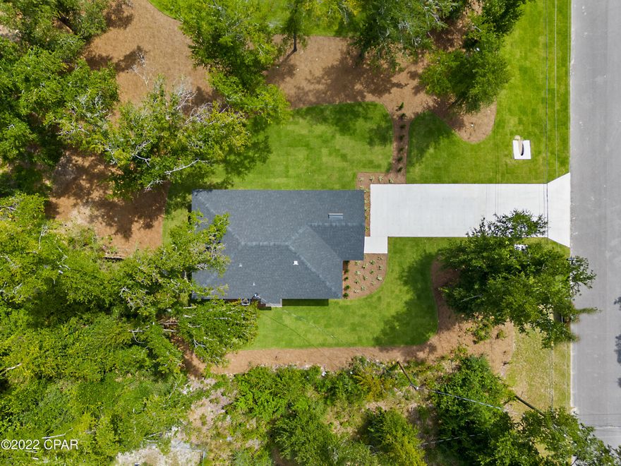 New Construction home built by Ryan Construction, ready for move in located in Southport, Florida. This immaculate, top designed home features high ceilings, robust fixtures, and grand finishes. This home was built to be an affordable home. It would be a great home to live in or rent out. The area is growing, and these are some of the first houses built on the street. Included in the home are: Quartz countertops, Moen plumbing fixtures, LED recessed lighting, irrigation system, LVP flooring throughout, laundry room, stainless appliances, storage space, open cell spray foam in attic, with lush landscaping. The home sits on a little over an acre and utilizes a septic system, and is hooked up to County water. 4035 Easy St is also for sale and built by the same builder. 1 year Builder Warranty