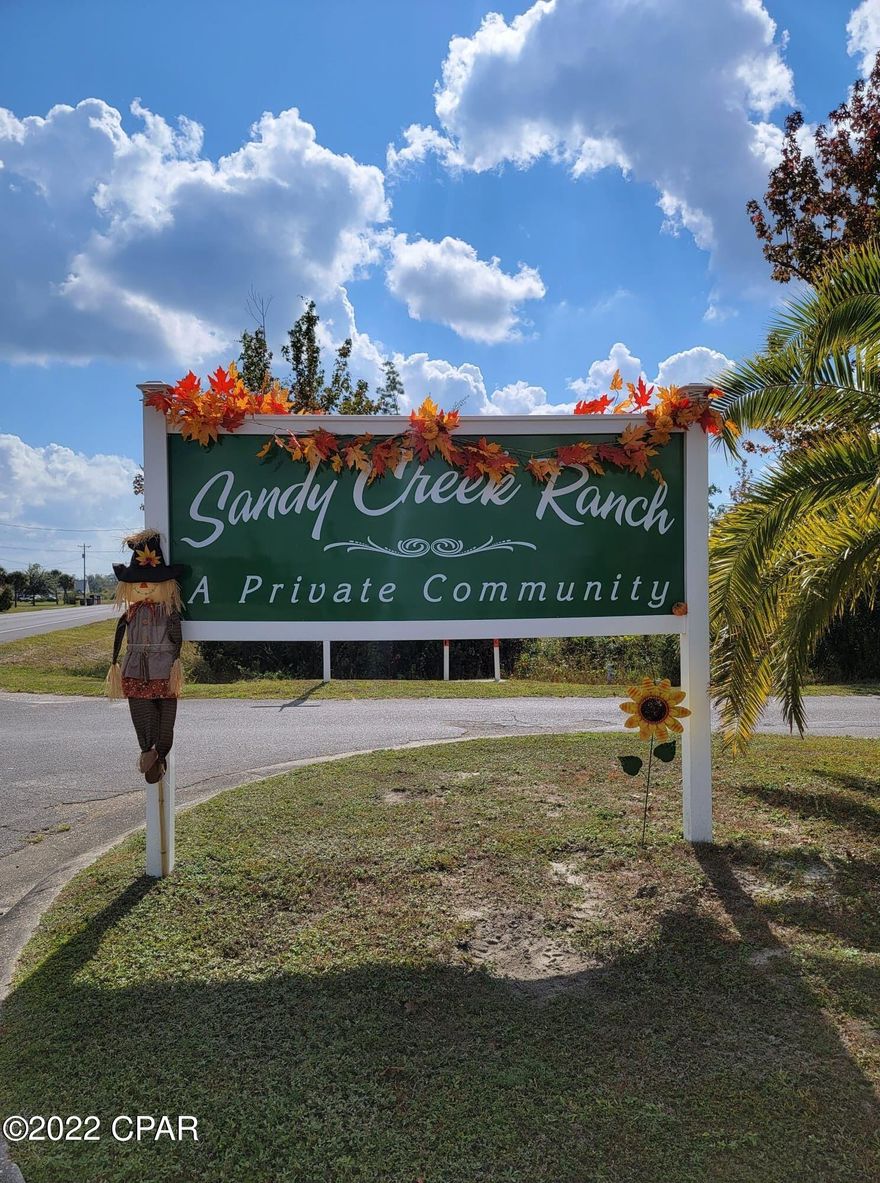 Pristine cleared lot waiting for the perfect person to come along and build their dream home. This 1/2 acre lot is in a private community with all utilities underground. Conveniently located near Tyndall AFB and within 30 minutes to Panama City Beach.