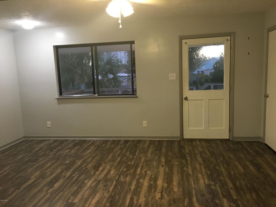 Available immediately for long term lease!  Unfurnished 2 bedroom, 1 bathroom apartment on the east end of PCB off Thomas Drive.  $1075/month and rent includes water, pest control and trash. Walking distance to the beach, convenience store and restaurants!