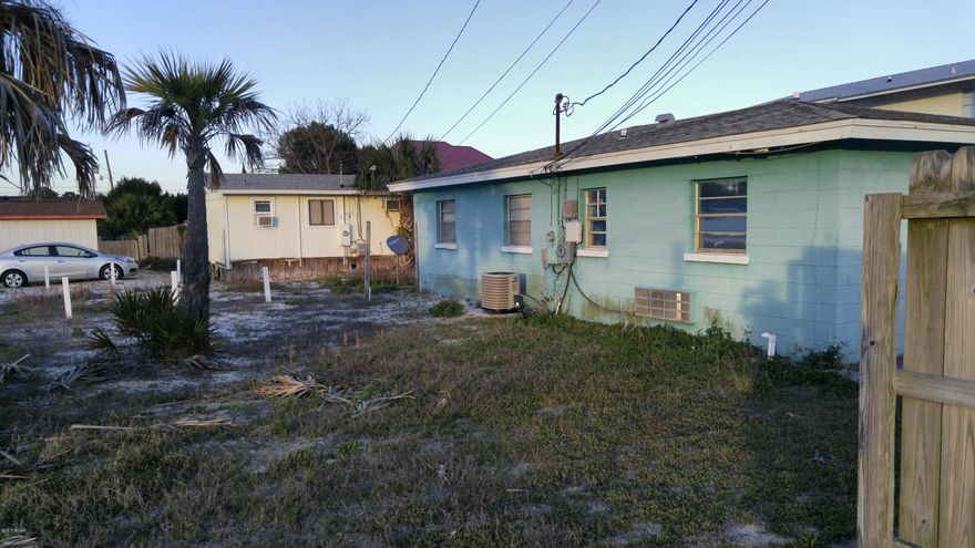 This is a unique property consisting of 2 structures. 1 is a cottage that has a 2 bed 1 bath unit and a 1 bed 1 bath unit with connection door and a separate cottage that is a 1 bath Living/bedroom area.

All 3 units are leased. 6512 AND 6514 BEACH DRIVE INCLUDED IN THE SALE There is also a separate lot that goes with these homes as the Septic system is located on this parcel, therefore can not be separated.