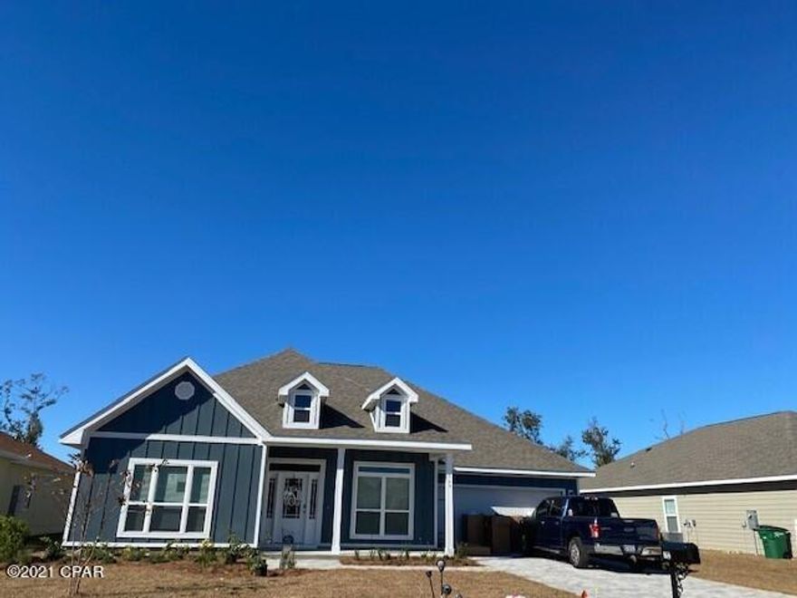 The McKenzie is a stunning 5 bed, 3 bath home located in the Plantation at College Point community! This community is just a short drive to nearby schools, restaurants, shopping, and not too far from the white-sand beaches and turquoise seas of Panama City Beach. As you enter this home, you will find elegant 9' ceilings and EVP flooring throughout the entire home excluding the bedrooms. Beautiful interior doors with brushed nickel hardware and granite kitchen

and bath countertops with undermount sinks are just a few of the added details. The home also features stainless steel appliances which include a smooth top stove, microwave, and dishwasher.

 Pictures may be of similar, but not necessarily of subject property, including exterior and interior colors.

This home is being constructed with the Zip Sheathing system, providing greater protection than a traditional housewrap from
damages due to wind, rain, and extreme weather.

This home comes standard with a Smart Home Technology package which includes a KwikSet keyless entry, Skybell doorbell,
automated front porch lighting, an Echo Dot device, and Quolsys touch panel which can be integrated to control your lighting,
thermostat, front door and so much more. A builder 10-year structural warranty is also included.