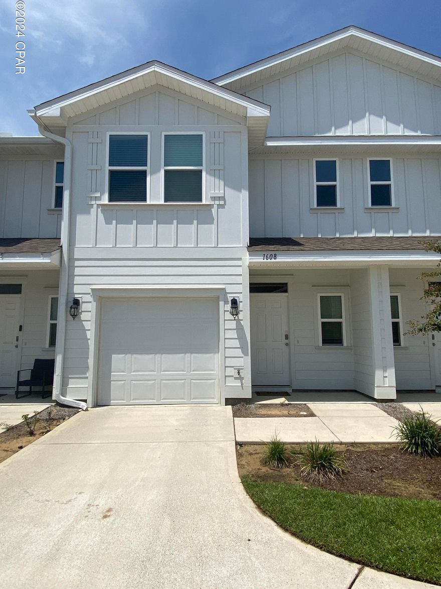 ** 1/2 OFF FIRST MONTH'S RENT ** LIKE NEW 3BD 2.5BA TOWNHOUSE W/ GARAGE in the heart of Lynn Haven and near Bay County's most requested charter schools and also near Mosley High School - Come enjoy the maintenance free lifestyle with no yardwork... LVP flooring & new carpet, granite counters, stainless appliances, shaker-style custom cabinets, huge pantry, breakfast bar that can seat four, recessed lighting, upgraded ceiling fans & fixtures, lots of closet space! W/D hookup upstairs by your bedrooms! Covered back patio. Landscaping included. Pets negotiable, restrictions & pet fee apply.