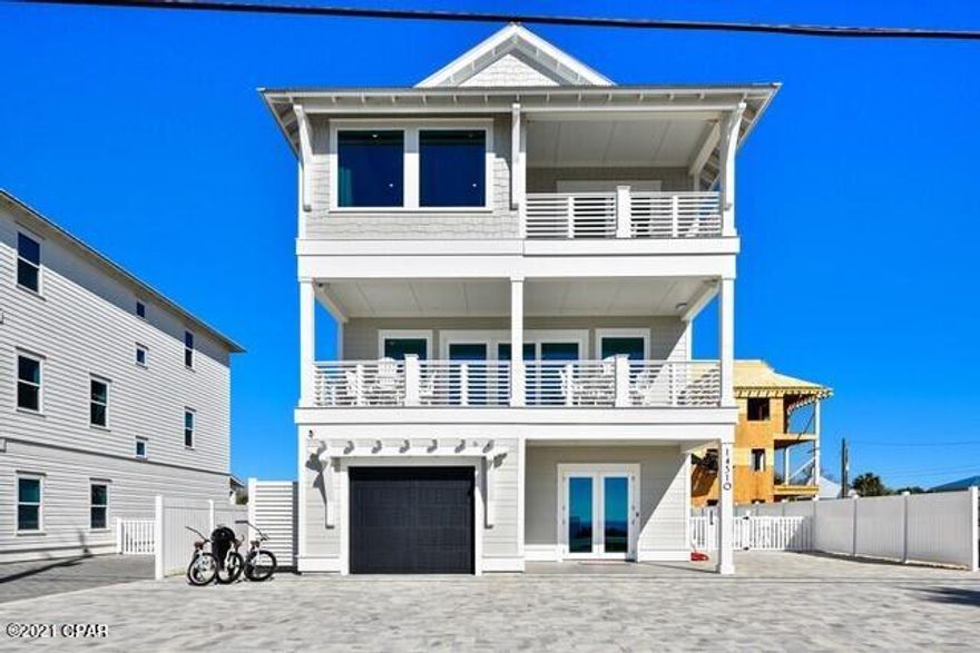 High Quality Jeter Construction new Beach House.  Completed in 2020, this 6 bedroom with one being a bunk house bunk room and 6 full baths, one 1/2 bath that sleeps 24 is a rental machine. A total of 5415 Sq. Ft. with 4480 conditioned air and also has a elevator.   Only rented for 13 weeks in summer of 21 due to owners usage in spring and fall, booked over 175,000.00 in owners revenue for this year.  Projected for 320,000.00 in 2022.  Fully decorated with Pool, rec area and plenty of outdoor area for entertaining and cooking.  Additional Refrigerator and Ice Machine in Garage.  Custom decorated and ready to go.