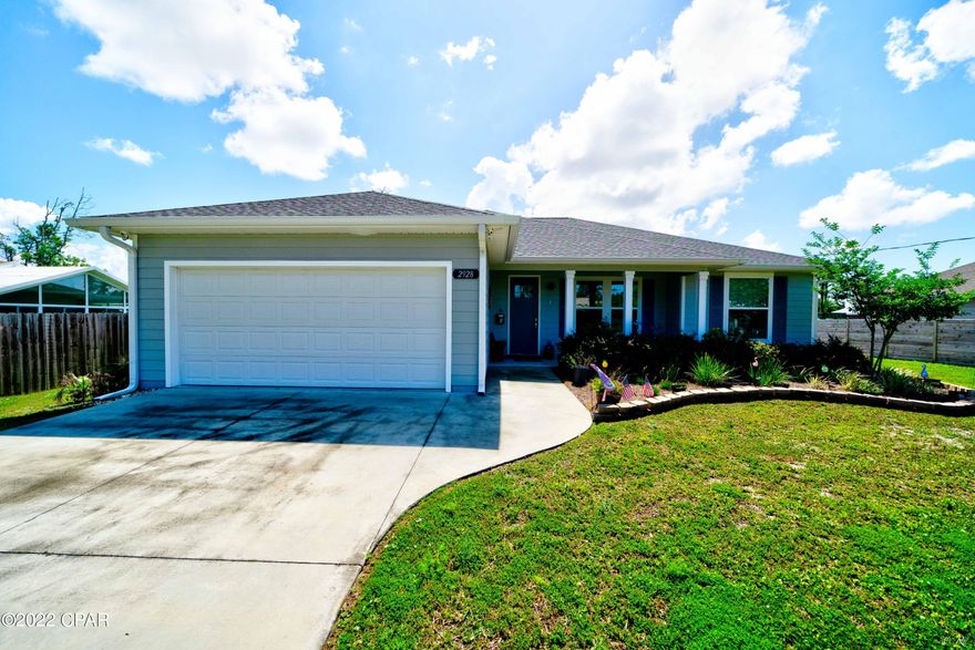Bright and open walking in the front door of this beautifully built home! Granite counters throughout.. Stainless steel appliances.. Owner has added many extras to this charming home including gutters, irrigation system, screened in back porch with pebbled walkway to new outdoor storage building (with power!), 4x6 window in the garage, ceiling fans and custom 2'' blinds in every room, motion detected flood lights and much more.. school bus pick up and drop off at front door.. Shopping just 2 miles away and beach only 9 miles! Add a pool if you'd like! High and dry, very quiet neighborhood, .83 lot! Seller relocating out of state, NO HOA, MUST SEE!