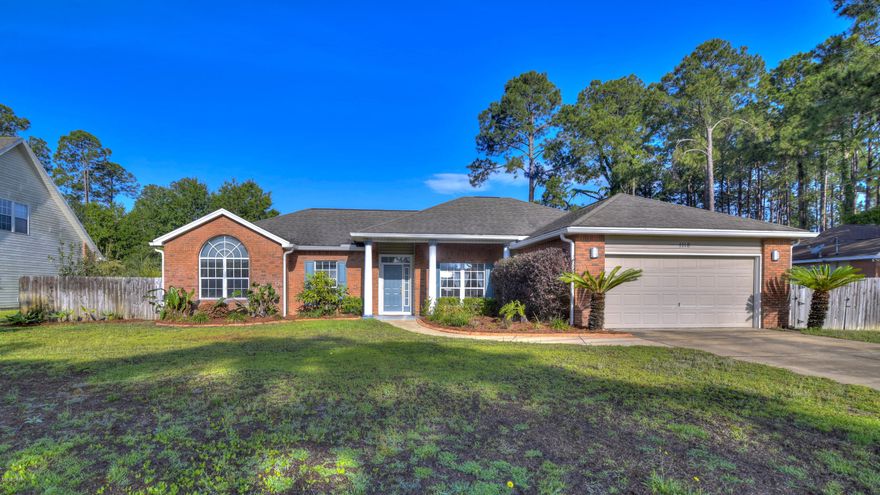 Charming 4 bedroom, 3 full bath home in the heart of Lynn Haven. This large 2,030 sq. ft. home has it all, including a 10 x 19 Grecian in-ground swimming pool, fireplace, vaulted ceilings, and French doors leading to a screened in porch. A split floor plan, the master bedroom is to the right, with 2 walk in closets, tray ceiling, deep garden tub and double vanity. The other 3 bedrooms are to the left of the living room and dining room, for added privacy. One bedroom has a private bath, perfect for an in-law suite. The eat in kitchen has a large pantry and is complete with all appliances and open to the living room area. The large 100 x 150 lot is perfect for any family activity, including a fenced in yard. Conveniently located, just 5 minutes to shopping on Hwy 77.