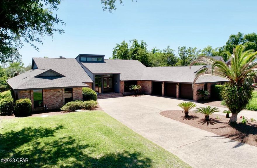 Nestled on the shores of Pretty Bayou. A Waterfront home in highly desired Kings Point is  Situated on an oversized half-acre lot, The home offers an amazing open concept design with 4 Bedrooms, 4 Full Baths, 1 Powder-room, and 3 Car Garage. This home at 2802 Canal Drive carefully blends modern design with the home's original mid-century style. From maintaining the stone fireplace to adding custom steel railing, all design choices were thoughtfully executed. The floor-to-ceiling windows, skylights, and light color palate provide a peaceful ambiance and abundant natural light. The Kitchen is appointed with quality appliances, 36'' induction range, custom hood, and Calacatta quartz counters with full-height backsplash. The waterfront, main-level master primary suite features a gorgeous en-suite bathroom, his and hers Restoration Hardware vanities, his and hers dressing areas, and an oversized custom shower with multiple jets for maximum relaxation. Spacious rooms create a generous floor plan ideal for entertaining and the beautifully landscaped outdoor areas are perfect for hosting large groups. This waterfront lifestyle is perfect for boat lovers: fish, spend time with friends, relax in the hammock, and enjoy the beautiful view. A new 140-foot seawall and second dock were added in 2021. Canal access to the bay and the ocean is direct, very quick and convenient - no long treks down narrow winding canals. Access waterfront dining in 10 minutes, to Shell Island and the Gulf of Mexico in 15 minutes. 2802 Canal Drive offers convenience for easy living, easy entertaining without crowds and traffic. Come see your new home today!

List of Improvements: New roof, including covered dock. Pinnacle Pristine architectural shingles with Scotch-guard Protector. New HVAC on west side. New water heater on west side. Custom 8-foot solid mahogany and leaded glass entry doors with transom. New and expanded dock with new seawall with added jet filters. Renovated jack-and-jill bathroom with updated wood vanities, quartz tops, new toilet, and new shower tile. Renovated guest bath with furniture-style solid wood vanity, quartz countertops. Renovated laundry room with elevated washer and dryer, dolomite counters, deep soaking sink, herringbone backsplash, and custom floating shelves. 24x24 floor tile throughout hall, guest bath, and laundry. New jet pump for automatic pool cleaner.

Available furnished; see the full list of improvements in the documents.