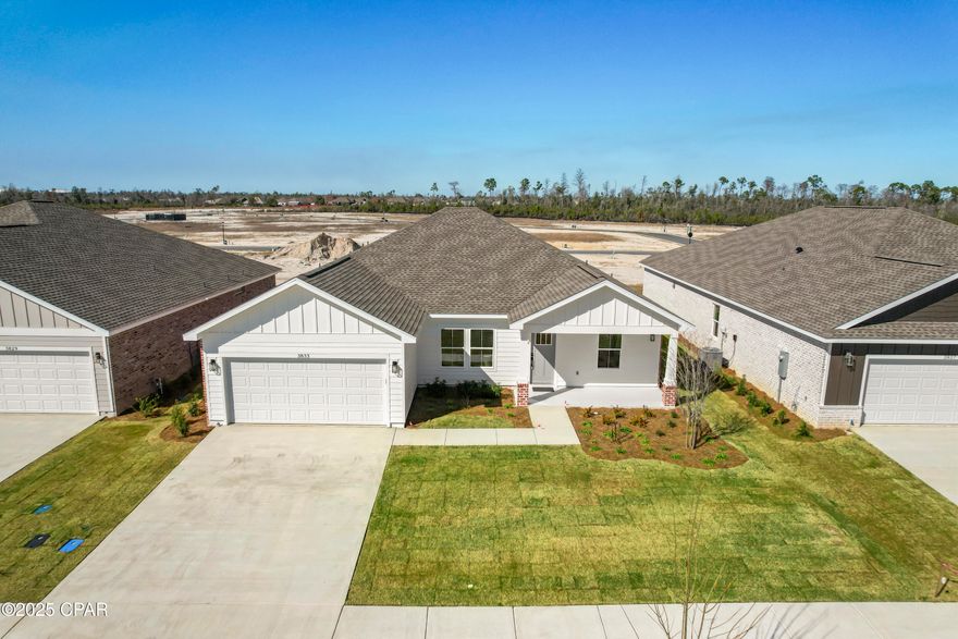 HOME IS PRICED WITH INCENTIVE INCLUDED FOR LIMITED TIME! *Special incentives for 5.99% interest rate and additional $3,000 towards closing costs with preferred lender OR flat 11k in closing costs* Welcome to Game Farm! A peaceful, secluded community you'll be proud to call home. Nestled in a central location in Panama City, this charming neighborhood has been thoughtfully crafted by local homebuilder Southern Coastal Homes. From the moment you arrive, a beautifully landscaped grand entrance and scenic bridge welcome you into an inviting environment. This community features wide homesites, three-sided brick homes, preserved natural areas, tranquil ponds, three future parks, and a walking path for residents to enjoy. Inside this home, you'll find a wide range of high-quality upgrades including a tankless gas water heater, 9-foot ceilings, recessed lighting, painted Hardie-board siding on the front exterior, a gas kitchen range, a gas line ready for an outdoor grill, and a fully sodded yard with a sprinkler system. Tray ceilings enhance the living room and master bedroom, while the master bath includes double vanities, walk-in shower with glass door, a large walk-in closet, and convenient access to the laundry room. Additional features include a utility sink in the garage and a practical drop zone as you enter from the garage. This home is filled with beautiful finishes and thoughtful touches offering comfort, style, and everyday functionality. This home is MOVE-IN READY! Buyer to verify any information deemed important.