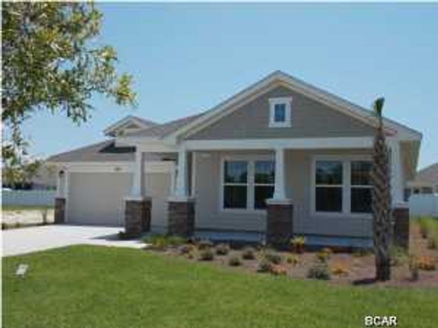 HUGE END OF YEAR INCENTIVES! plus $3500 closing cost contribution (if using builders preferred lender)MOVE IN READY NOW!!! Prepare to be swept away by this gorgeous 4 bedroom 2 bath David Weekley home. One of our most popular floor plans will greet you with hazelnut finished hardwood floors throughout the main living area and kitchen. This Coastal Contemporary kitchen overlooks the spacious family room and casual dining room with features like Caledonia granite countertops, 42'' white painted wood cabinets, pencil tile backsplash and stainless steel appliances leaves nothing else to wish for in this chef's dream. Large front porch and extended back lanai for entertaining. This home faces an expansive common area perfect for playing with the kids or pets. Breakfast Point is Panama