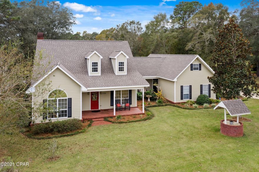 Beautiful Southern Style home in Dogwood Lakes sitting on 2nd and 7th Green of the Golf Course. Home has so much to offer with formal dining room, kitchen open to great room with gas insert fireplace. First floor Master Bedroom. The additional two bedrooms upstairs with full bath (lots of storage). New added Florida Room with abundance of windows and 1/2 bath steps away from the inground pool. The property consists of a storage building with additional storage room attached to carport (whole area of carport and storage room is floored for storage)