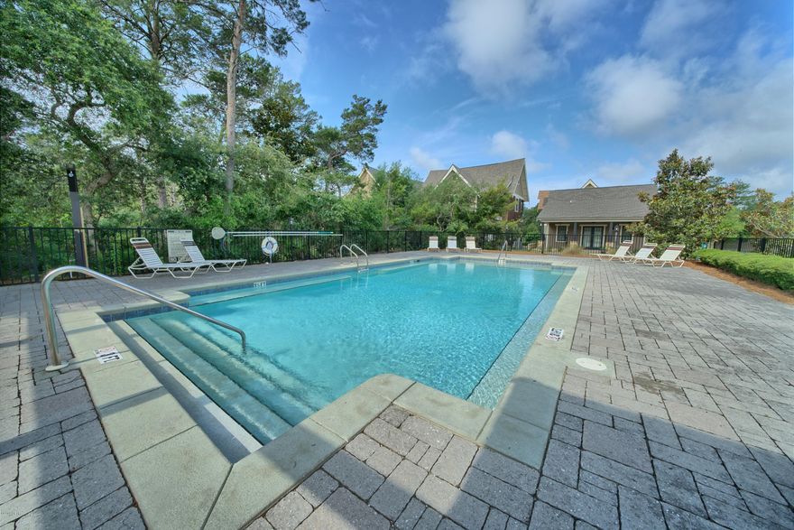 *******LARGE PRIVATE LOT on SANCTUARY DR.**** Located in the EXCLUSIVE GATED COMMUNITY OF SANCTUARY BEACH!. Sanctuary Beach is one of Panama City Beaches most exclusive and PRIVATE GATED COMMUNITIES located close to shopping, dinig, golf, tennis. Grand Lagoon marinas and more.  This is one of the LARGER LOTS which backs up to a protected wetland area with UNSURPASSED PRIVACY!. In addition, this lot is just steps away from the beautiful/private COMMUNITY POOL. Dont let this opportunity to own this FANTASTIC LOT to build your DREAM BEACH HOME pass you by!!.