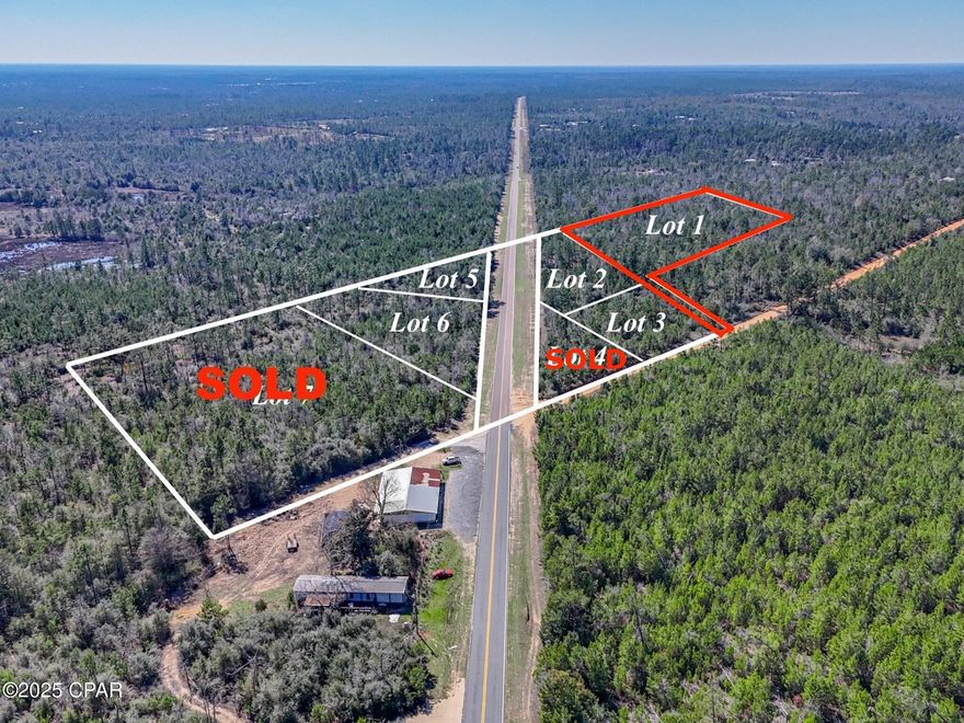 Lot 1.  This stunning property is located off CR 167, just 4 miles east of Hwy 231 and is conveniently situated near some of Florida's most beautiful springs.  See NWF Water Management website for a list of the springs along the Chipola River Basin as well as Econfina Creek Wildlife Management area.  Zoning is AG and allows 1 house per acre.  The pristine beaches of the Gulf Coast are approximately 90 miles, Tyndall AFB is about 40 miles, and the Chipola River Picnic Area & Boat Ramp is about 20 miles.  The Compass Lake community sits just north of the property and is home to Compass Lake & Silver Lake.   See MLS Numbers for the additional lots: MLS #s: 769160, 769161, 769163, 769164.   If measurements deemed important, please verify.