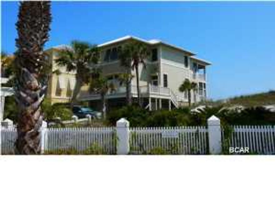 Permanent is the quintessential family beach home. Sitting atop a pristine sugar sand dune, overlooking the turquoise waters of the Gulf of Mexico, this home has everything a family could ask for in the perfect beach home. There is a large parking area opening into an over-sized double garage on the first level, along with a separate storage/workshop area and a private elevator entrance, so you don't have to take the stairs if you chose not to do so. The first living level consists of a very large living room with fireplace and built in shelves and cabinets, spacious kitchen with island and gulf views, large laundry room, dining area and wet bar (also with gulf view). In addition, there is a master suite on that floor and a powder room. The third floor consists of an  additional living/family room, two bedrooms, each with a bath and a master suite. The home has magnificent porches on three sides of the house and a large deck area plumbed with natural gas for easy grilling off the kitchen. This sale includes plans for a guest house on the property. The home is being sold furnished with a few exclusions of art work and personal items.