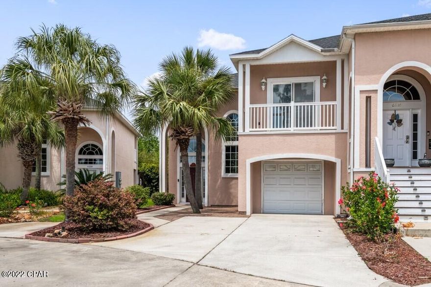 CURRENTLY UNDER CONTRACT, SELLER WILL CONSIDER BACKUP OFFERS  Beautiful End Unit Townhome That Is Spacious And In The Quiet Complex Of Grand Lagoon Villas. This Townhome Is Close To Everything Including The Beaches, Restaurants, Shopping & Marinas. Features Include: Beautiful View of Grand Lagoon From Private Balcony Off Of The Spacious Master Bedroom, Private Open Deck, Large Screened In Patio, Breakfast Bar & Loft Area Big Enough To Use As A Sitting Area Or Office, Single Car Garage, New HVAC (Approx. 1 Year Old) & Much More! Call Today To Arrange Your Private Viewing Of This Residence Today. As Always Buyers To Verify All Information Deemed Important Including: Sqft., Room Dimensions, HOA Fees, Taxes, Etc.