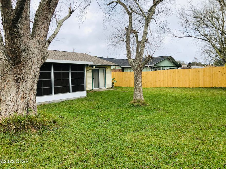 This lovely home is ready to move into.  The home is charming with a fireplace in the living room, eat in kitchen and separate dining room.  It even has a nice Florida room with big windows over looking the backyard.  The laundry room is extra large and great for additional storage.  This home is located close to everything with the beach, restaurants and parks a short golf cart ride away. Bicycle enthusiasts can access the nearby bike trail to cycle over to Frank Brown park as well as to the pier for a great day of fishing or lounging at the beach.  The home has a new roof as of 2019, newer AC unit and the backyard has new fencing.  Schedule your private tour before it's too late!