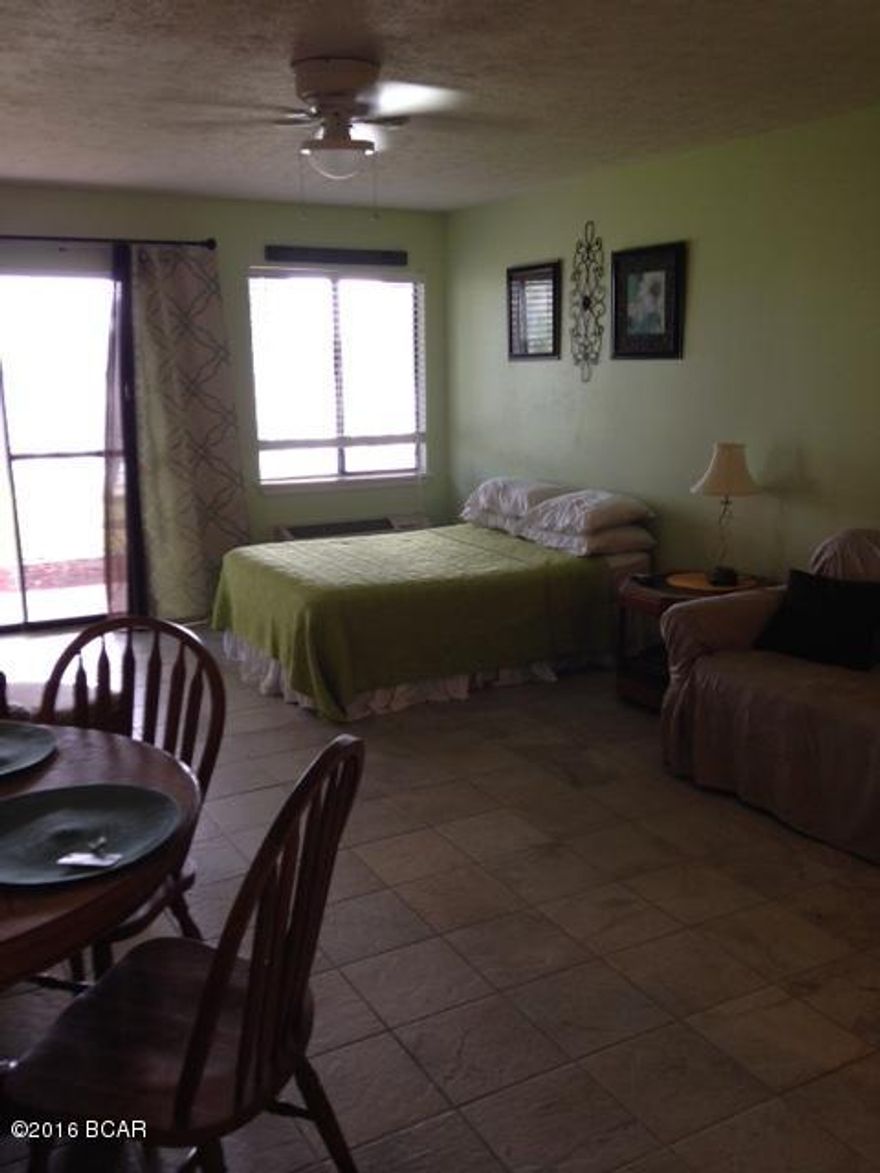 If you're looking for a weekend get away look no further.  This ground floor end studio unit is located on rare 28 acre Lullwater Lake with a fabulous view directly from your patio. Amenities include a pool overlooking the lake, suffle board and a dock for fishing.  The beach is only steps away or drive a short distance to restaurants, shopping and entertainment at Pier Park.  This unit would make a great rental property for anyone interested in an investment.