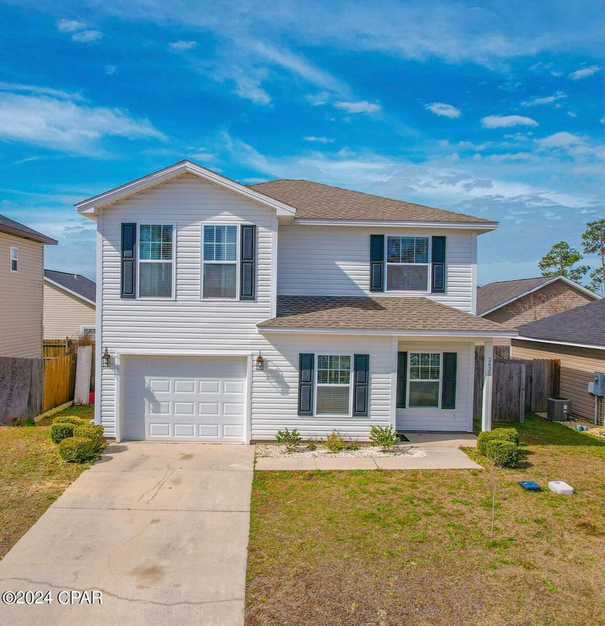 'CURRENTLY UNDER CONTRACT, SELLER WILL CONSIDER BACKUP OFFERS' . RENOVATED contemporary 2-story home, located in the Coastal-Victorian community of Avondale Estates. When you hear move-in ready, that defines this home. There have been numerous updates over the last few years to include newer roof, HVAC 2021, painted 2024, newer LVP flooring downstairs, newer carpet in the bedrooms, blown cellulose insulation (old insulation removed), easy maintenance vinyl siding in 2019, shutters, new sliding glass door, new ceiling fans and light fixtures, and so much more. The downstairs features an open floor plan with a large living room, breakfast room overlooking the brick paver patio through the sliding glass door, surrounded by a fenced in backyard.  The kitchen features stainless steel appliances, solid surface countertops, and upgraded real wood cabinets.  There is also a half-bath on the 1st floor for added convenience, as well as direct access to the garage  for easy access bringing groceries into the home.  The upstairs features the master bedroom with a private master bath, as well as the 3 other bedrooms, and a full bath.     These owners have taken pride in ownership to get this property in perfect condition for the listing. Avondale Estates is a wonderful community with walking trails and centrally located to shopping, local restaurants, area attractions, and 20 minutes from Tyndall Air Force Base, and 35 minutes to the beautiful emerald-green water and white sandy beaches of Panama City Beach.  As an added bonus, this home is in a rural housing designated area with 100% financing. If this sounds like the property you have been waiting for contact your realtor today for a private showing. At this price, for a newly renovated home, it will not last long! LOOK UNDER THE PICTURE SECTION FOR A VIDEO WALK THROUGH.   Age, Sq.Ft., Room Dimensions, lot information, Schools, or any important information to the buyer must be verified via personal or professional inspection or appraisal.