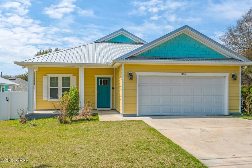 Don't miss this well built 3 year old home with tons of upgrades.  This home has performed excellent as a vacation rental and may provide you with years of investment income or serve as a perfect home for living.  Some of this homes features include a large lot, septic in the front yard if you have plans for a pool, large patio, and Jacuzzi.  A quick five minute walk will take you to some of the worlds most beautiful beaches.  Extremely well constructed home with hardy board, siding and a metal roof.