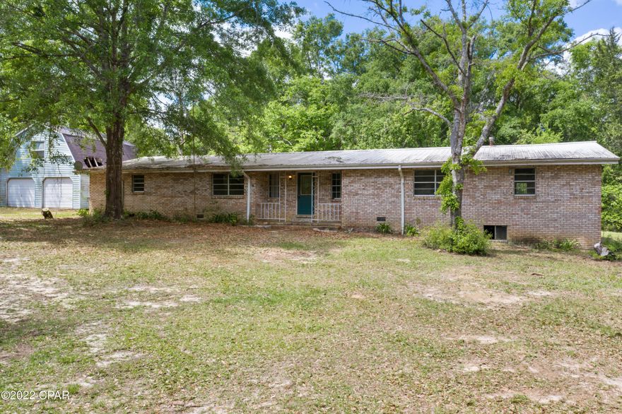 Great investment opportunity with this 3 bedroom, 2 bath fixer upper situated on over 15.5 acres! Inside features include family room with gas fireplace, formal living room, spacious dining/kitchen, master bedroom with en suite bath and an additional office. Home is in need of some work but has tons of potential! Property is located on Bonnett Pond Road minutes from Hwy 277, Chipley and Vernon.