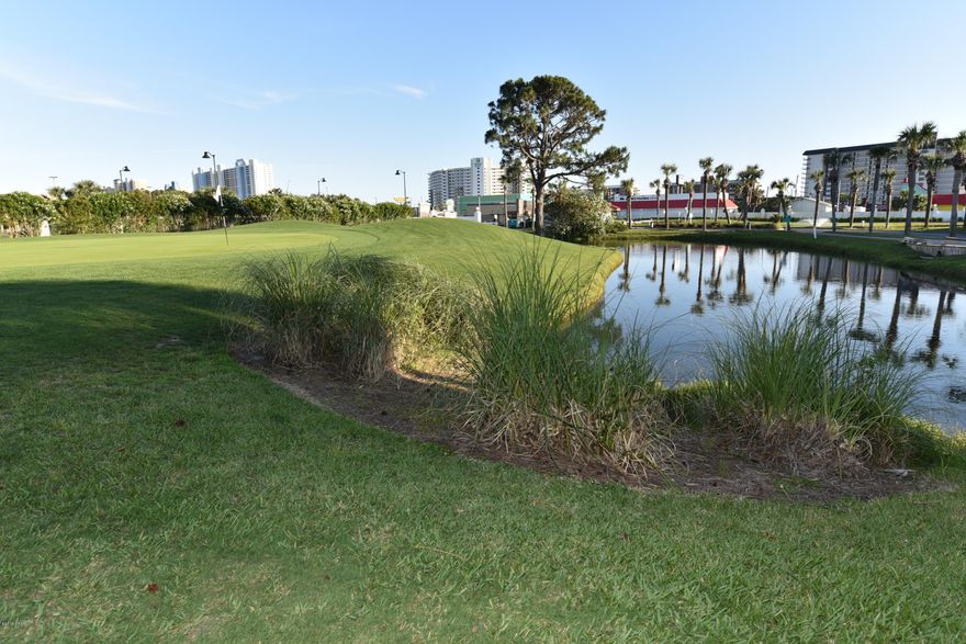 Nice Ground Floor Condo For Sale at pet friendly Edgewater Beach Resort. This well maintained Villa is located on Hole 7 with a pond view. Many upgrades throughout: New kitchen, updated baths, tile flooring, AC 2016, WH 2017. Relax with coastal breezes on your covered balcony. Spacious Master Bedroom with en suite bath and tile shower. Offered furnished, rental ready. Villa is steps to a heated pool and beachfront amenities are a short walk or tram ride away: Tropical/Heated Pools, Hot Tubs, Sun Decks, Beach Access. Restaurant, Room Service, Poolside Bar, Market, Pizza Shop. Kids Club features Splash Pad and planned activities. At The Club owners play unlimited Golf, Basketball, Tennis and Shuffleboard. Enjoy the Fitness Center with Salon Services. Manned, Gated Entrances, 24-hr Security