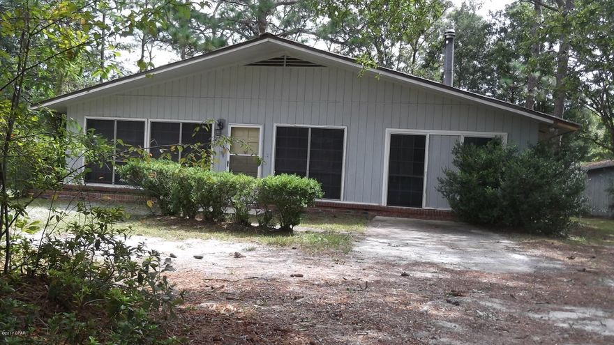 2 Bedrooms 1 Bath Home on 15 Acres. 5 acres cleared in front, 10 acres in woods behind home for hunting. Cute home that needs some TLC. Heating and Cooling unit replaced in 2016.  New Metal Roof 2017. Unfinished back room could be third bedroom.