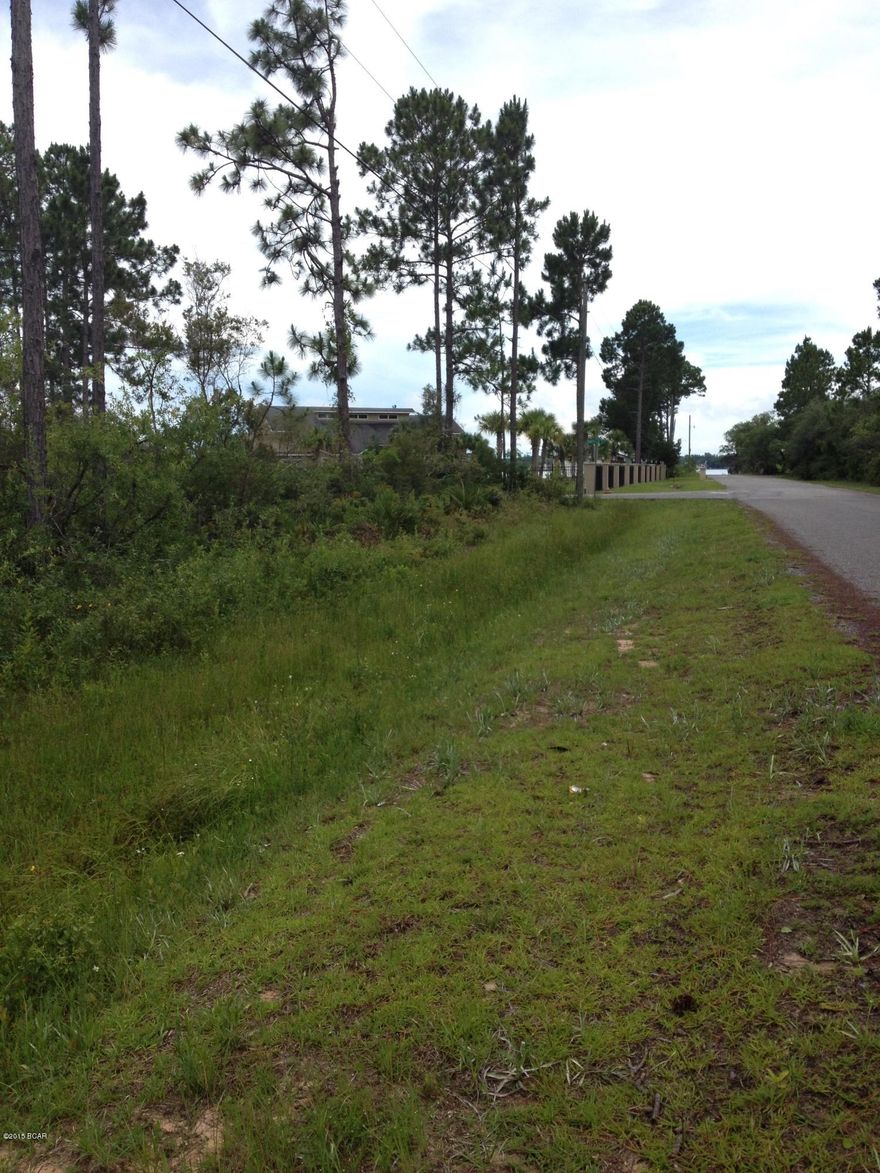 Great building lot!  Back on the market!Beautiful residential lot just a short walk from the bay.  Nice quiet neighborhood and close to everything.  This parcel can be divided into two parcels if need be.  Owner is anxious to move this property. Bring an offer and let's make it happen!!