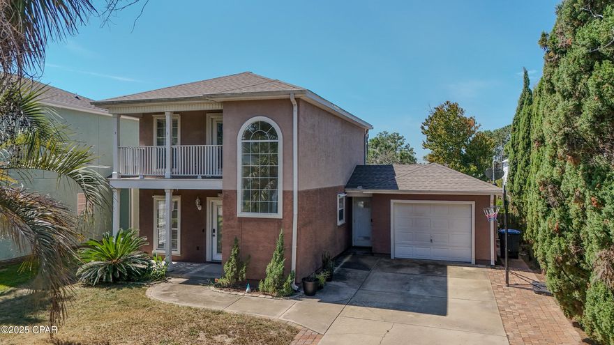 This spacious two-story home on S Lagoon Drive offers three bedrooms and two bathrooms, with one bedroom and full bath located downstairs and two bedrooms upstairs that share a connecting bath. One of the upstairs bedrooms features a private balcony with a water view of the lagoon. The home has a mix of tile, laminate, and hardwood flooring throughout, along with granite countertops in the kitchen. A large fenced yard and expansive back deck provide plenty of outdoor space for relaxing or entertaining, and the single-car garage offers additional parking or storage. Situated just a few blocks from the beach and only two blocks from the Dolphin Drive boat launch, this home makes it easy to enjoy the best of coastal living. There is also plenty of room to park a boat in the backyard or driveway. Pet friendly upon approval and with a pet fee.