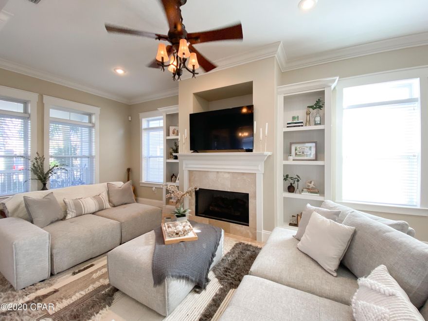 CURRENTLY UNDER CONTRACT, SELLER ACCEPTING BACKUP OFFERS.  Welcome to sought after Turtle Cove at Lake Powell! This ideal community offers everything you're looking for, including a lakefront clubhouse, community pool, dog park, tennis courts, and a fishing dock.  Inside the residence you'll find beautiful high-end travertine flooring throughout the home, granite countertops, 10 foot trayed ceilings, crown molding, plantation shutters, built in bookcases, master bathroom jacuzzi tub, wet bar, and a beautiful fireplace.   Each bedroom has their own full bathroom and both front and back porches are screened in. Seller will offer fully furnished on approved deal.