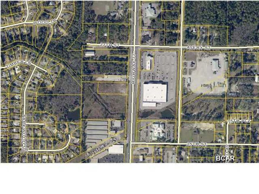 2 Acre Parcel located on HWY 77 in Panama City across from Kohls' shopping center. This property consists of nearly 300 feet of frontage on HWY 77 and 300 along 27th street. The possibilities are unlimited with the strong growth in Lynn Haven and surrounding areas along with the location being at a 4 way traffic signal. There are very few parcels left north of 23rd St on HWY 77 making this site very desirable. Call your Realtor today and drive by to take a look.