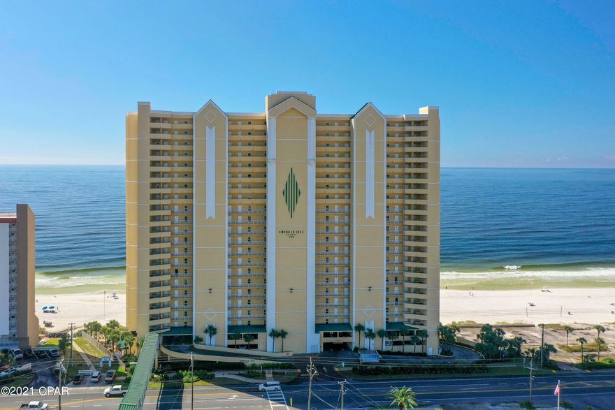 Come experience this West End of the beach gem!  Emerald Isle is in a quiet area of Panama City Beach with gorgeous gulf front views from every unit - Wake up to the sight of beautiful Emerald waters right from your bed!  With two bedrooms and two baths, you can sleep 6 when using the pull out sofa.  Spacious is the key word with a 27' x 10.5' balcony with access from the living room and master bedroom. The kitchen is well appointed with custom cabinets and granite countertops.  The living room furnishings are new along with new AC (inside and out) and new water heater.  Other features include a pub top dining table, stackable washer and dryer, tile floor in kitchen, living and bathrooms and laminate in  bedrooms, breakfast bar, and cultured marble bathroom vanities and tub surrounds. A big plus is how much storage the unit has and it comes with an exterior storage closet as well for your beach items, extra paint, etc.  The amenities are top notch with two pools, hot tub, steam room, fitness center, pavilion with bbq grills, beach chair service and covered parking.  Gross rental income is approximately $40,000+ per year.  Close to groceries, Pier Park, and some great dining options!  Come see the beautiful views for yourself today!