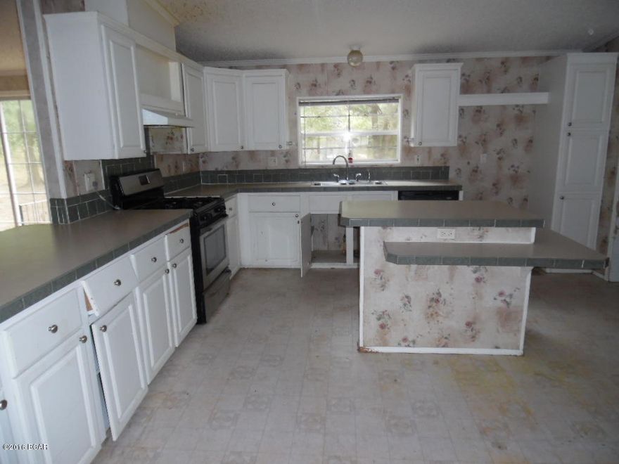 Large Double Wide with 4 beds and 2 baths which sits on a nice lot. Kitchen has a center island This property is eligible under the Freddie Mac First Look Initiative through 12/19/2016. During the first 20 days this home is listed for sale in MLS, only offers from owner-occupants, public entities or their designated partners will be considered. Offers from investor purchasers may be submitted, but they will not be considered until after the initial 20 days of the listing.Seller will offer an allowance up $500 to owner occupant for a Ho0me Warranty of buyers choice.