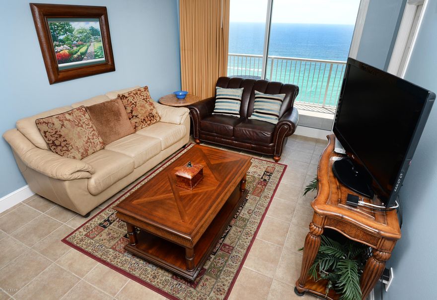 Beautifully decorated 1180sq.ft 2Br/2Ba unit in excellent condition. Upgraded tile and fresh paint throughout. Matching custom tile work on kitchen and wet-bar backsplashes. Master bedroom and living/dining area are gulf front. Ensuite Master Bath features separate glass shower, whirlpool tub, doubly vanity and separate dressing area. Living area and master bedroom open up to gulf front balcony. Prime floorplan for rental/resale. A great little weekend getaway or a wonderful investment opportunity. Call today for a showing! EXCELLENT RENTAL INCOME POTENTIAL. Well maintained – new water heater & new clothes dryer installed in 2016. Enjoy the good life at Majestic Beach with an unparalleled deck of resort style amenities including: 650 linear feet of sugar white GULF FRONTAGE, , Four Large outdoor pools (2 at Tower I and 2 at Tower II), Two Indoor heated pools (one in Tower I and 2 at Tower II), Two Indoor heated pools (one in Tower I and one in Tower II), Two hot tubs, Baby pool, Wading pool with waterfall, H20 Bar and Grill serving Gulfside/Poolside lunch and dinner, Large outdoor dining area, State of the Art Fitness center with steam room and sauna, 130 seat Stadium seating Movie Theatre, Convention center, Private Owner's Lounge with full Kitchen, Tennis Courts, Majestic Market featuring Starbucks coffee. Quick distance to the wonderful shopping, dining and entertainment at Pier Park. FROM THIS CONDO, YOU ARE WITHIN STEPS OF EVERYTHING YOU COULD EVER WANT AT THE BEACH!