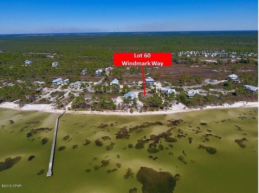 1st Tier Bay View Lot in Windmark Phase I, offering coastal living along the shores of St Joseph Bay. What a great location for a Beach Home in this Gated upscale community known as Windmark Beach. Lot 60 is a rectangle shape 74.99 ' x 132.30', plus there is a 10' strip of land to the bay, making this a flag shaped lot. This lot offers excellent Bay views, more than any other, because the property owners on both sides of this lot own both gulf front & 1st Tier lot and have placed homes in the middle of property. This allows the subject property more opportunities for Bay views from front and sides of home. Gated Phase I has a community pool and club house as well as several docks for fishing. Amenities also include Town Center, community pool, bike and jogging trail and beach access points Pet Friendly Community & Beach. Survey, House Plans and Structural Plans included. The bay front lot is also for sale MLS 300299, which would provide ownership from street to bay. Both neighboring owners own from street to bay.