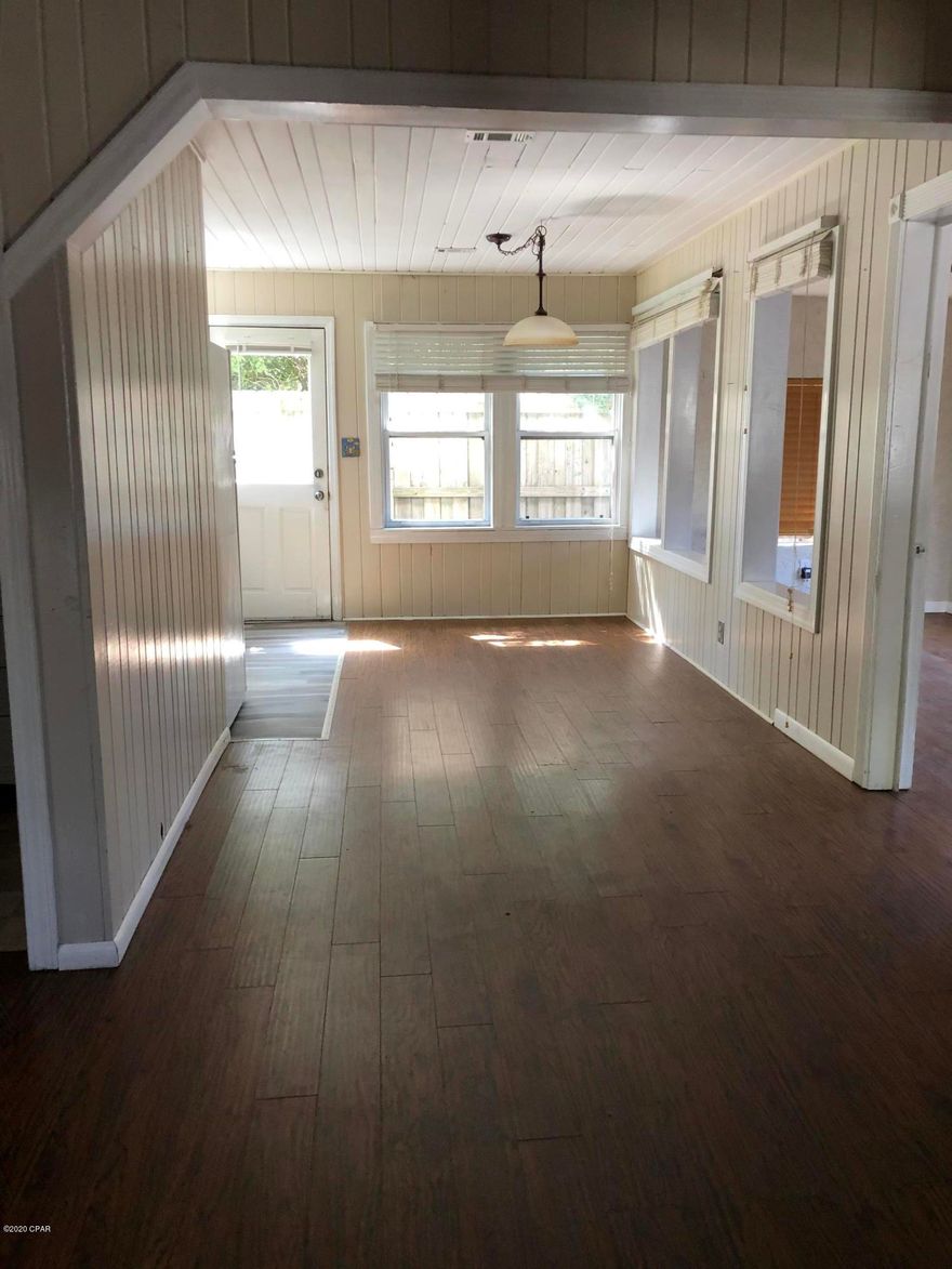2 Bedroom 2 bath beach cottage within 1-1/2 blocks from the beach. Open floor plan and enclosed Florida room. Large fenced back yard, covered deck