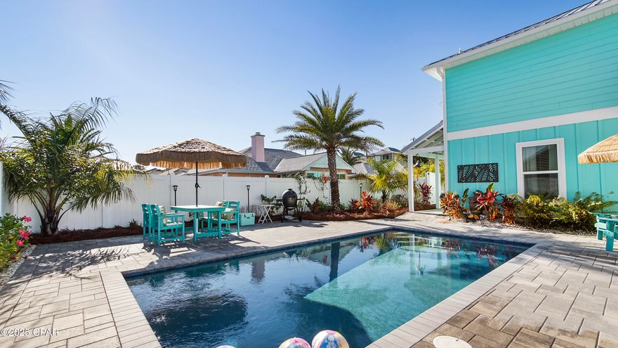 Salty sunsets and coastal tranquility await!
This beautifully designed 3-bedroom, 2.5-bath home offers an open and airy living space with charming peek-a-boo ocean views that instantly set the tone for relaxed coastal living. Step onto the balcony, sip your favorite beverage, breathe in the salty air, and soak in breathtaking sunset skies.

The spacious primary suite is a private retreat featuring an ensuite bath, two closets, and its own private balcony overlooking the stunning pool area. Outdoor living truly shines with a private pool and inviting entertaining spaces, creating the perfect setting for both relaxing and hosting guests.

Ideally located just a short walk to the beach, dining, and local entertainment, this property also offers access to three neighborhood boat launches and is only a quick drive to St. Andrews State Park. Shopping, restaurants, and live entertainment are all easily accessible by golf cart, enhancing the effortless coastal lifestyle.

Enjoy the freedom of NO HOA and the added peace of mind of no flood insurance required. The property offers abundant parking along with a spacious two-car garage, providing plenty of room for vehicles, golf carts, boats, and all your coastal essentials.

Whether you are seeking a primary residence, second home, or income-producing investment, this thoughtfully designed and impeccably maintained property is a standout coastal opportunity.