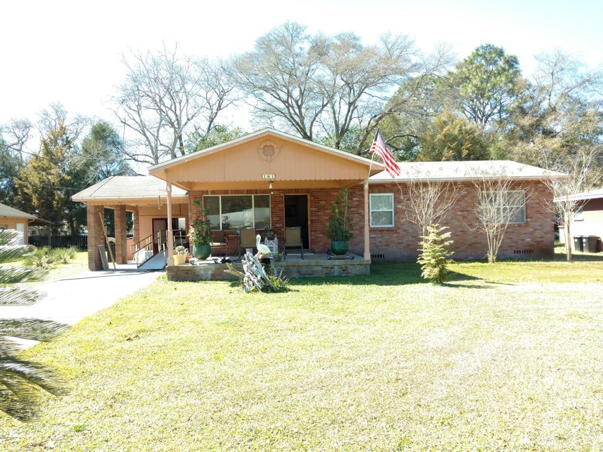 Wonderfully Maintained Home on 2 Lots, almost 1/2 an acre right off Tyndall Parkway. 2nd lot features a Pole Barn built in 2011 & double detached garage with workshop and lean-to storage in the back. MAN CAVE DREAM! Inside the home you will enjoy this spacious open floor plan with remodeled kitchen and appliances in 2013. Fridge 2015. Throughout several years the wiring has been upgraded along with the plumbing- replaced from the meter at the street. 5 windows replaced in 2015 with double pane energy efficient sets. The HVAC was replaced in June of 2015. READY for the hot, humid summer ahead. $2000 FLOORING ALLOWANCE!  Interior has a ski lodge feel & this home was on the way to a complete interior remodel until the Owners had to change plans to move to Tennessee. THEIR LOSS IS YOUR GAIN ! Soffet and Facia being replaced around the house with vinyl by next week 3/16/16.  Stained Glass Lamp over dining room table is not included in the sale and will be replaced. This is a clean home shared by a tidy and clean couple. There is no dishwasher in the kitche, however, the lower cabinet between the sink and the stove can easily be removed to add a dishwasher- the plumbing can tap right into the sink plumbing, still leaving more than enough storage space in the kithcen. You won't find a lot of homes in this price range, in this condition, with this amount of property. The Pole Barn itself is a 20K addition ! A Must See.