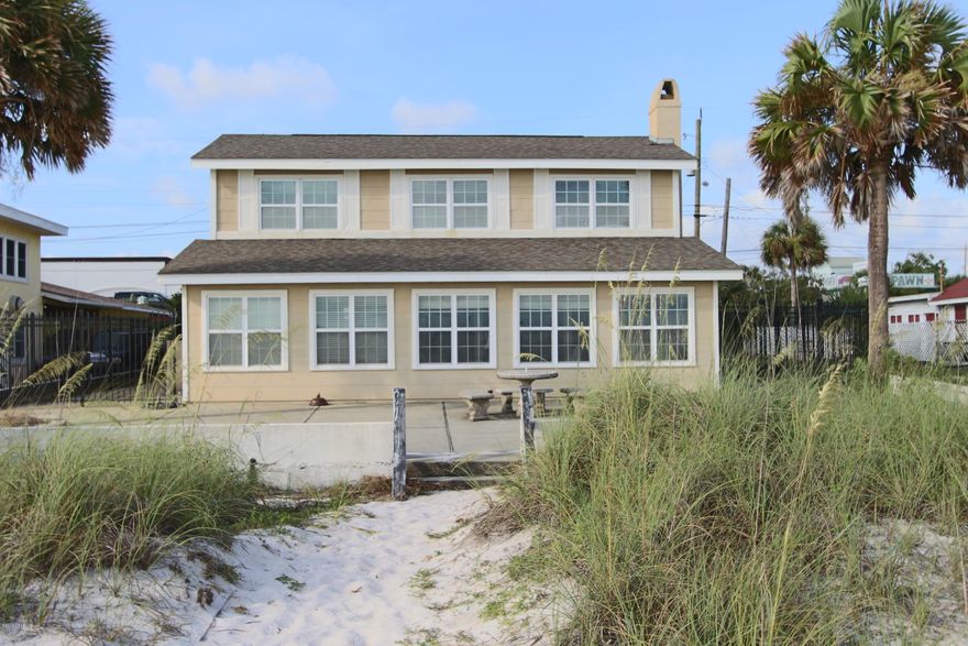 Great Beach House right on the Gulf of Mexico. 6 bedrooms and 6.5 baths. This property has great income potential; even though it has never been used as a rental property. The home boast that ''Old Florida Charm''. The main house is spacious with lots of room for entertaining. It has magnificent views of the Gulf of Mexico from every angle. It is comprised of 4 bedrooms with the master bedroom being located on the first floor and 3 additional rooms on the 2nd floor. There are 2 additional bedrooms w/ baths and another full bath for use after coming up from the beach located off of the carport area. There is covered parking for at least 6 vehicles and additional area that could be used for parking as well. Please make an appt. and see it today. Roof is approximately 5yrs old.