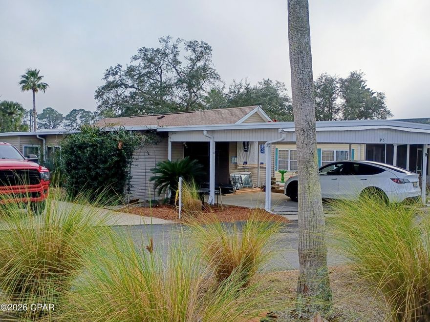 Handyman Special in Emerald Pointe Resort.  Roof was replaced after Hurricane Michael and recently repaired after small dryer fire.  Electrical and plumbing checked out. Fire caused mostly smoke and water damage. Seller has done most of the work, still needs some cosmetic attention. Great buy with similar sized homes in Emerald Pointe selling for $225,000 and up.  Convenient location close to pool and gate. Emerald Pointe is on the beach across from the Navy Base. HOA is  $2,600/year and you own the land your trailer is on. No lot rental fees.