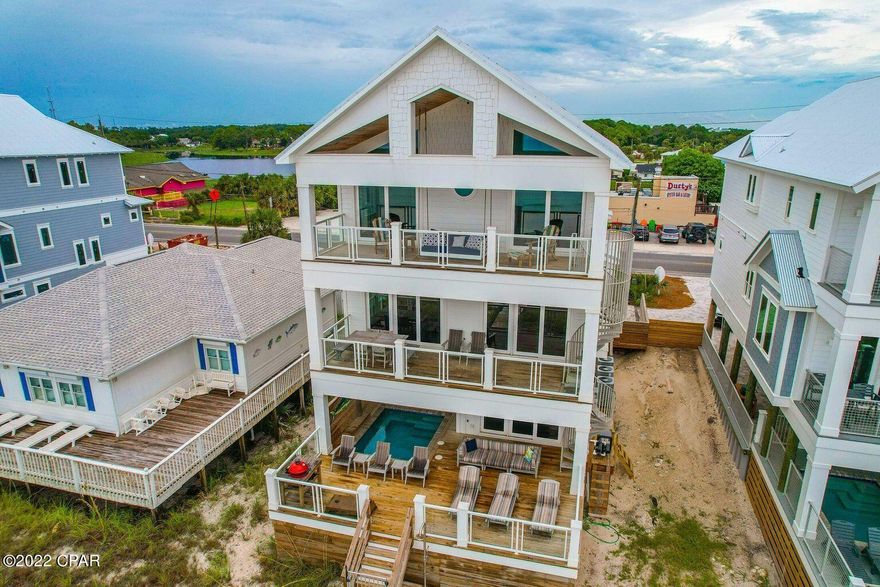 TURNKEY RENTAL MACHINE!!
''Pier Park Paradise'', is a beachfront home located on the West end of Panama City Beach. Just a short walk to some of the best shopping, restaurants and attractions in Pier Park! Across from Dustys! This beachfront home featured with a private beachside pool, private boardwalk and stunning ocean views from every angle (including the balcony bed swings)!



Just inside from the pool deck on the first floor is a seating area with flat screen TV, pullout queen sofa bed, foosball table and full bathroom. It's perfect for hanging out inside while still having an open view of the pool and grilling area. The sliding glass door opens up to an 8x12 private pool and has surrounding lounge chairs, outdoor games plus an outdoor charcoal grill. THIS IS A MUST SEE HOME!!