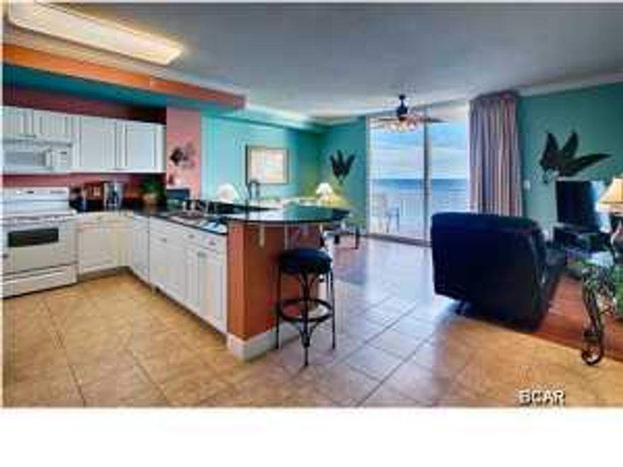 SELLER IS READY TO SELL!! Tidewater is not only one of the most amenity rich destinations in PCB, but one of the best values as well. Unit 1906 is a one bedroom, two bath condo with built in bunk bed in the hallway! With the sleeper sofa this condo sleeps 6 comfortably! Other features include 9 foot ceilings, granite counter tops, tile in foyer, kitchen and hallway and baths. Condo also includes very nice laminate hardwoods in living area and bedroom. Additional upgrades include new lighting and fans in bedroom, master bath and living room. With a sleeper sofa, this condo can sleep 6 comfortably. One of the best locations on the beach, just minutes away from Pier Park and right next to Hwy 79 to avoid any traffic concerns or a quick easy ride to and from the airport. Resort