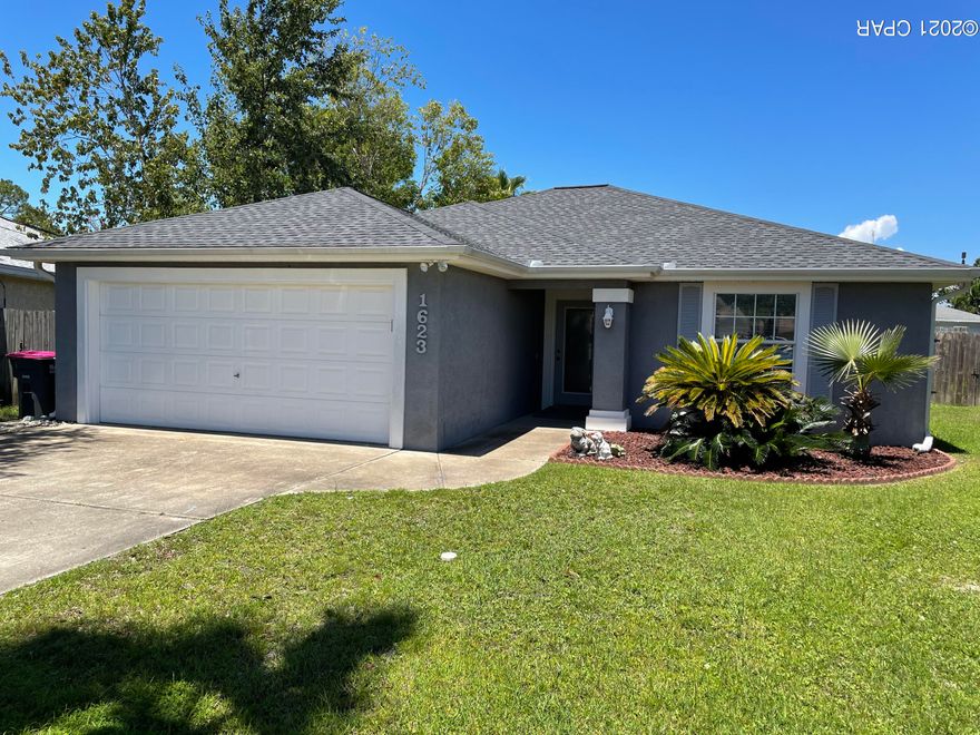 'CURRENTLY UNDER CONTRACT, SELLER ACCEPTING BACKUP OFFERS Great Floorpan! Great Location! Great House! Great Price! This three bedroom 2 bath home has an open floor plan with a true, two car garage, ample storage and a large, fenced back yard. Bring your kids, pet, grill and your beach towel. You are only minutes to the beach! New air conditioning and range/ cooktop. Charity Village HOA is not active and there is no HOA fee. Road is private.