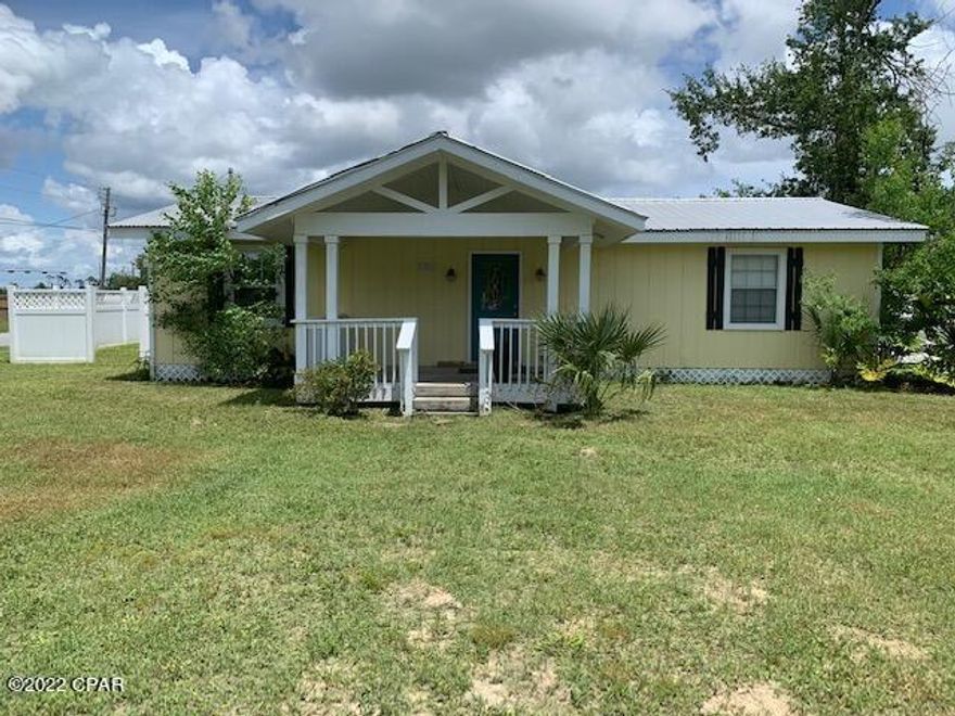 Cute cottage style home with mixed use zoning, great corner lot for home or office!  Lot next to house is also available for additional space.