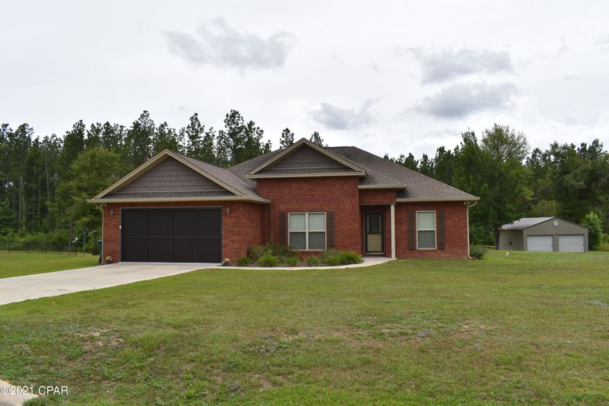 This gorgeous 3BR/2.5BA brick home has so many extras that go with it! Tray ceilings in the living room and master bedroom, w/ two walk in closets in master bath, whirlpool and a separate shower, wide crown molding, hardwood, tile and carpet floors, breakfast bar, a eighty gallon hot water heater, two car attached garage and so much more.                                                    

  Outside features are a full house Generac generator, sprinkler system, screened in back porch, patio, storage building, two car stand alone garage w/electrical in place, 2 wells (one for the fishpond), stocked fishpond (brim/catfish) , and a storm door on the front door.