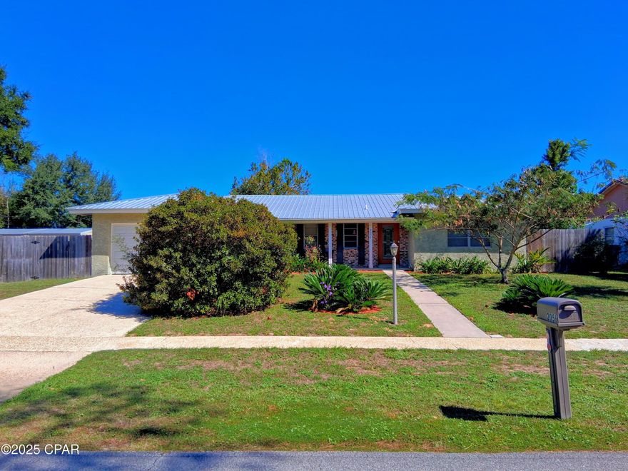 Come settle in to this well built, well maintained, and thoughtfully updated home in the Sunny Hills subdivision. They sure don't make them like they used to! With over 2,000 square feet of living space, it boasts 4 bedrooms, 2 and a half bathrooms, a formal dining room (or office), a large living area, a Florida room that is heated and cooled, a large outbuilding wired with power, a garage, plenty of closets and storage space, many beautiful flowering plants, and more, all on almost a half acre! The kitchen, air conditioning system, paint, electrical wiring, and floors have all been updated within the last several years. The guest half bathroom has been updated, but many of the ''vintage'' features that add character have been retained. Boat Lake is less than a half mile away, and many other lakes, ponds, creeks, rivers, springs, and wildlife management areas are also nearby. You'll be a short drive to downtown Chipley and/or I-10 for commuting, or just about 45 minutes to the Gulf beaches. Sunny Hills does not have HOA fees, but there are restrictions. Reach out for a showing, you won't be disappointed!